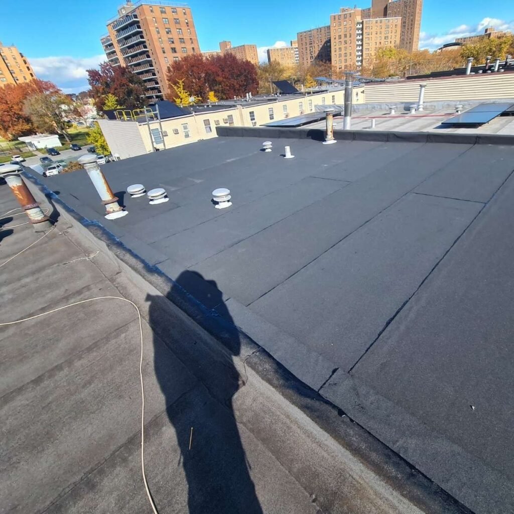 Flat roofing contractor by Best Construction Choice