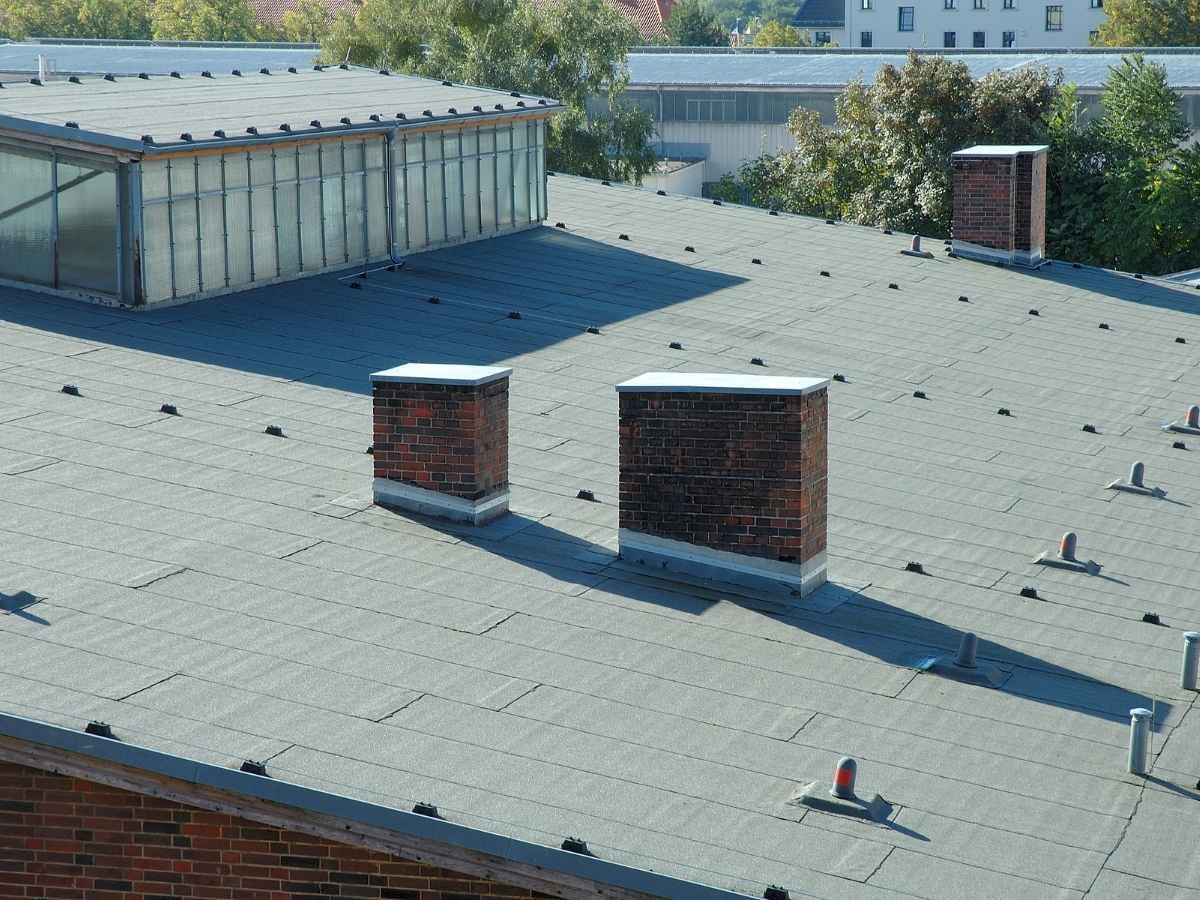 Commercial flat roof inspection on an industrial warehouse building in the Bronx New York